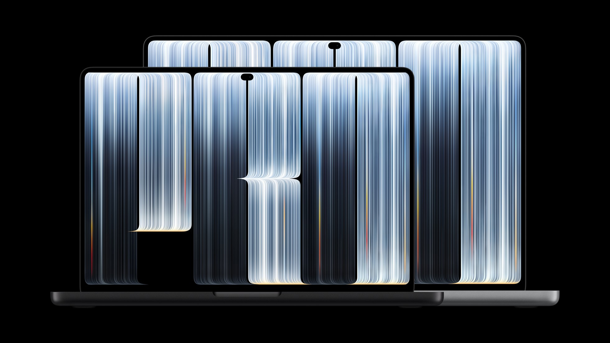 Два MacBook Pro с экранами PROLED XDR на чёрном фоне.